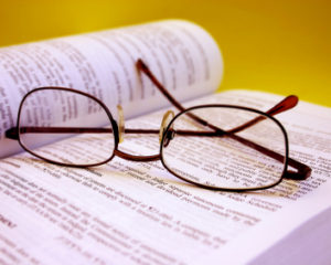 eye glasses on book